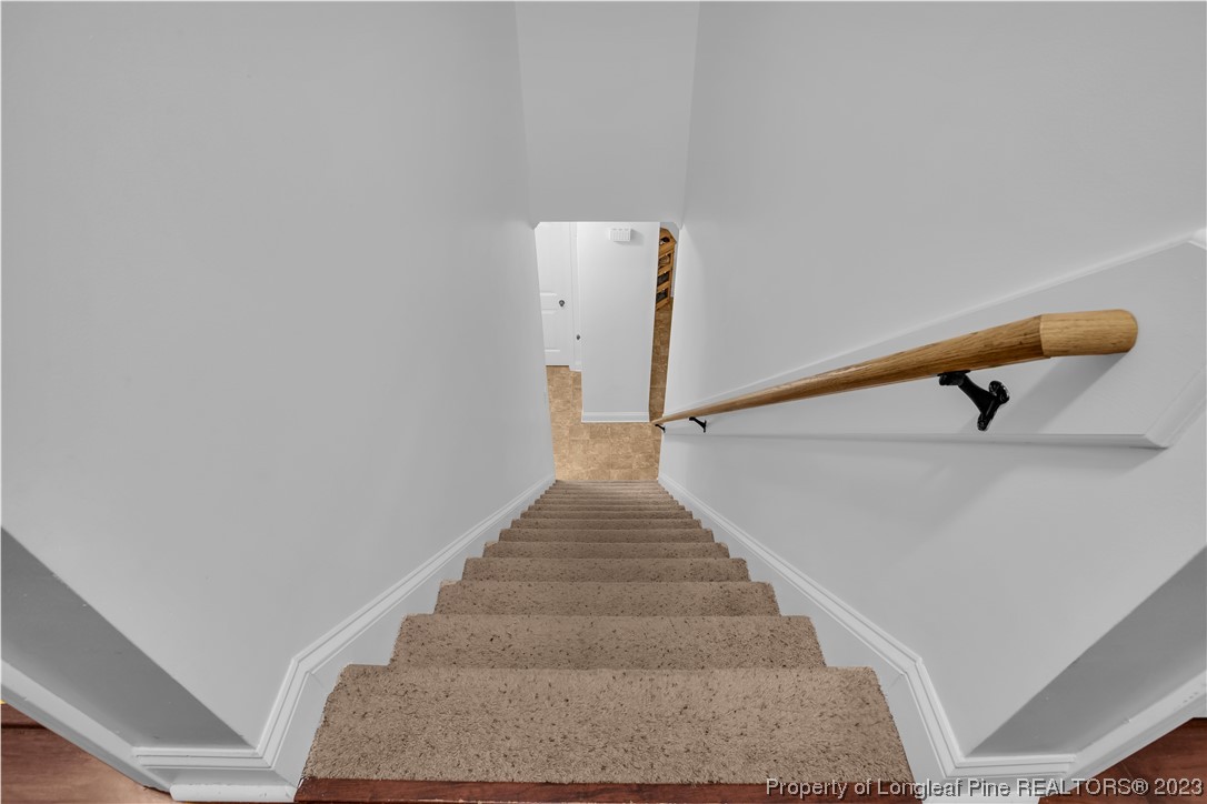 80 Valor Circle Bunnlevel, NC 28323 - Photo 44 of 49 a view of staircase with white walls