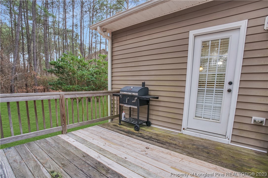 80 Valor Circle Bunnlevel, NC 28323 - Photo 46 of 49 a view of a balcony with wooden floor