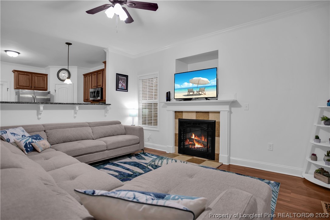 80 Valor Circle Bunnlevel, NC 28323 - Photo 8 of 49 a living room with furniture and a fireplace