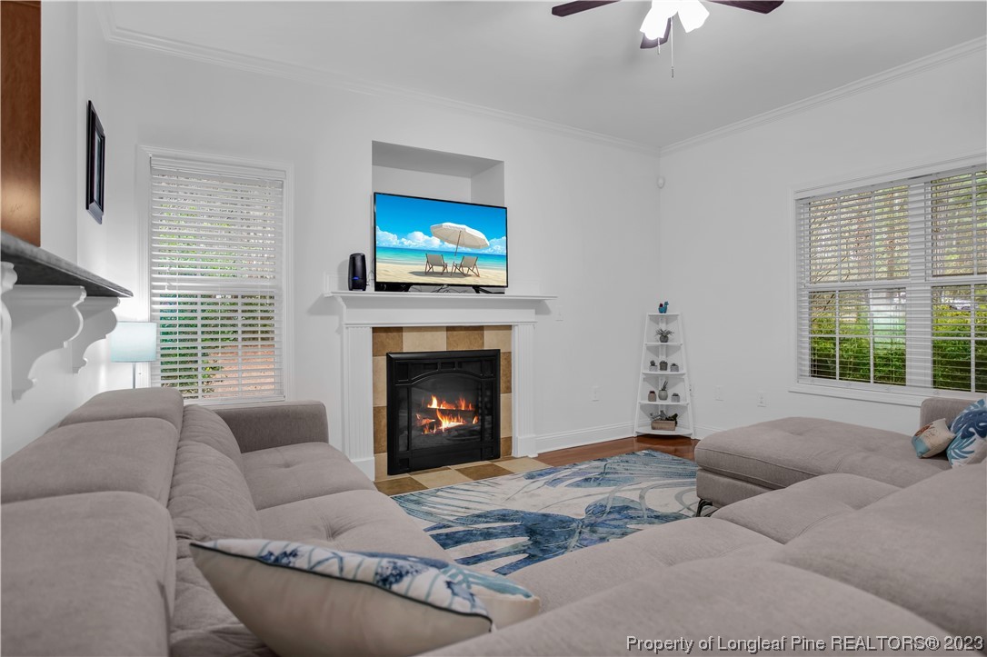 80 Valor Circle Bunnlevel, NC 28323 - Photo 10 of 49 a living room with furniture and a fireplace