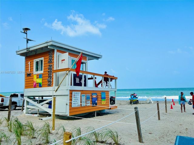 a view of a balcony with many windows