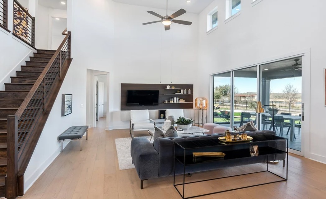8608 Turaco Trail Austin, TX 78744 - Photo 10 of 20 a living room with furniture and a flat screen tv
