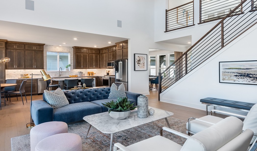 8608 Turaco Trail Austin, TX 78744 - Photo 8 of 20 a living room with furniture kitchen view and a potted plant