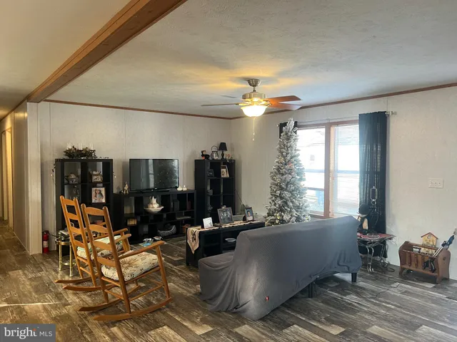 a living room with furniture and window
