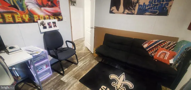 a view of workspace with lounge chair