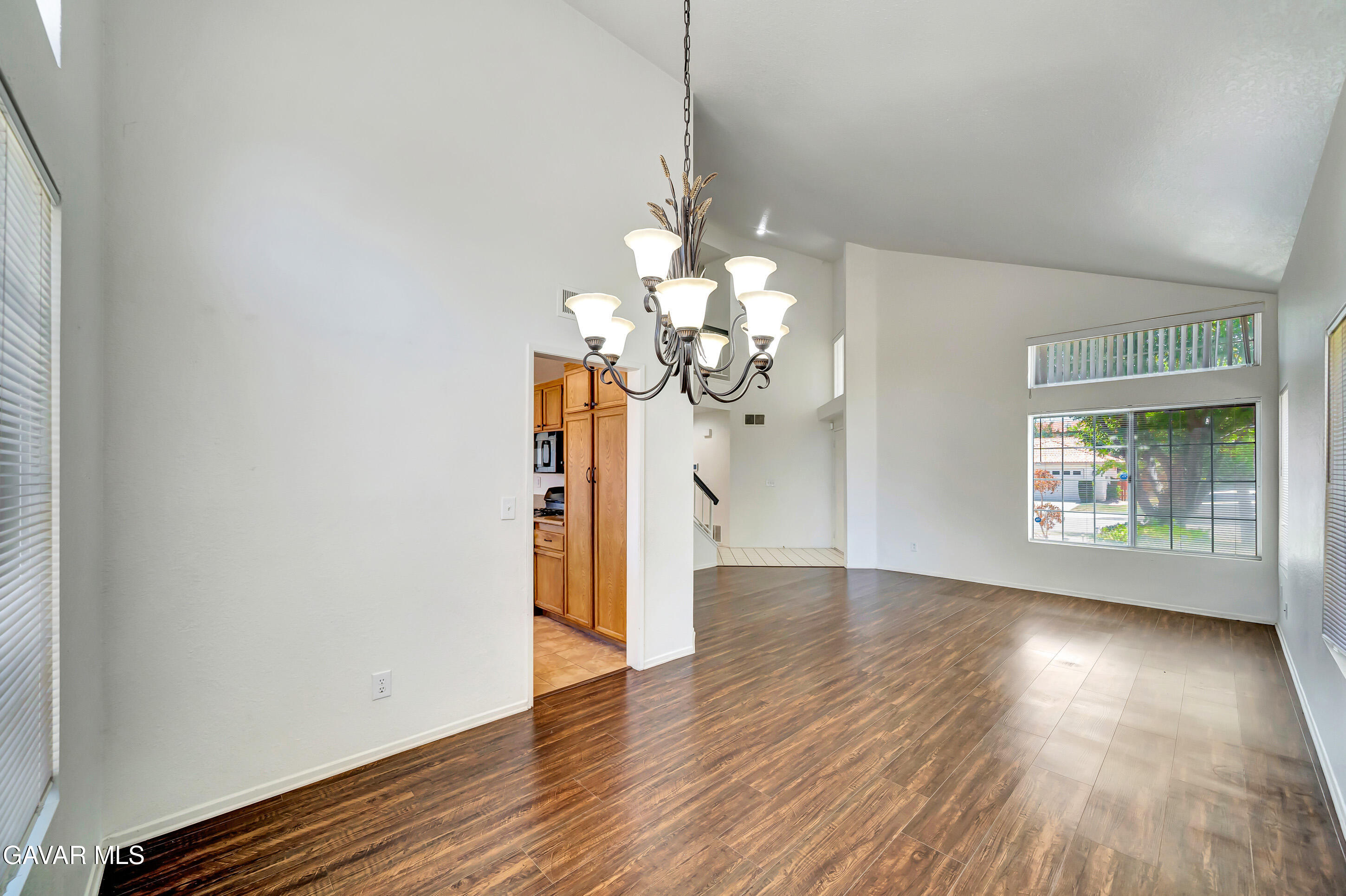 3115 Crowne Drive Palmdale, CA 93551 - Photo 11 of 51 a view of a livingroom with wooden floor