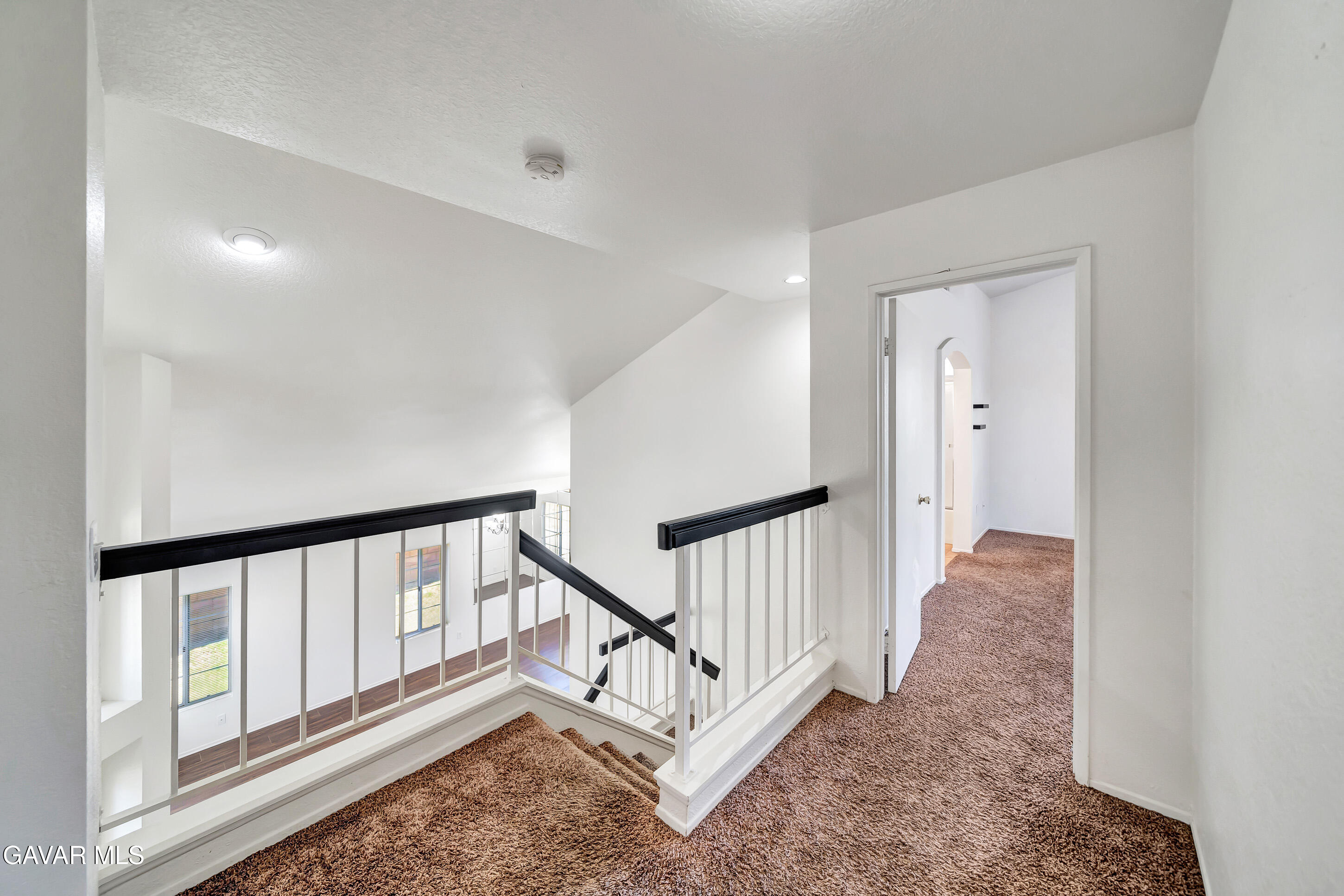 3115 Crowne Drive Palmdale, CA 93551 - Photo 39 of 51 a view of a hallway with staircase