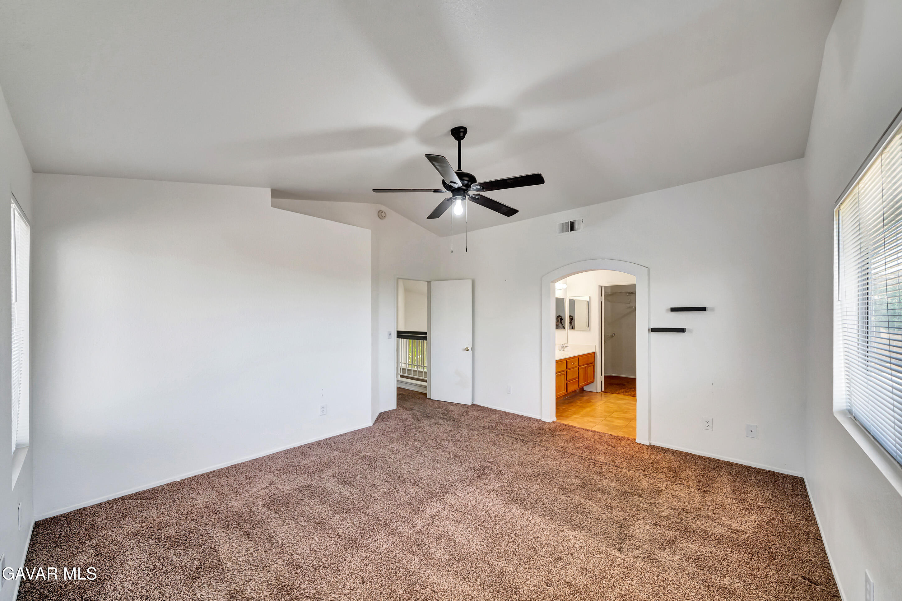 3115 Crowne Drive Palmdale, CA 93551 - Photo 42 of 51 a view of a livingroom with a ceiling fan and window