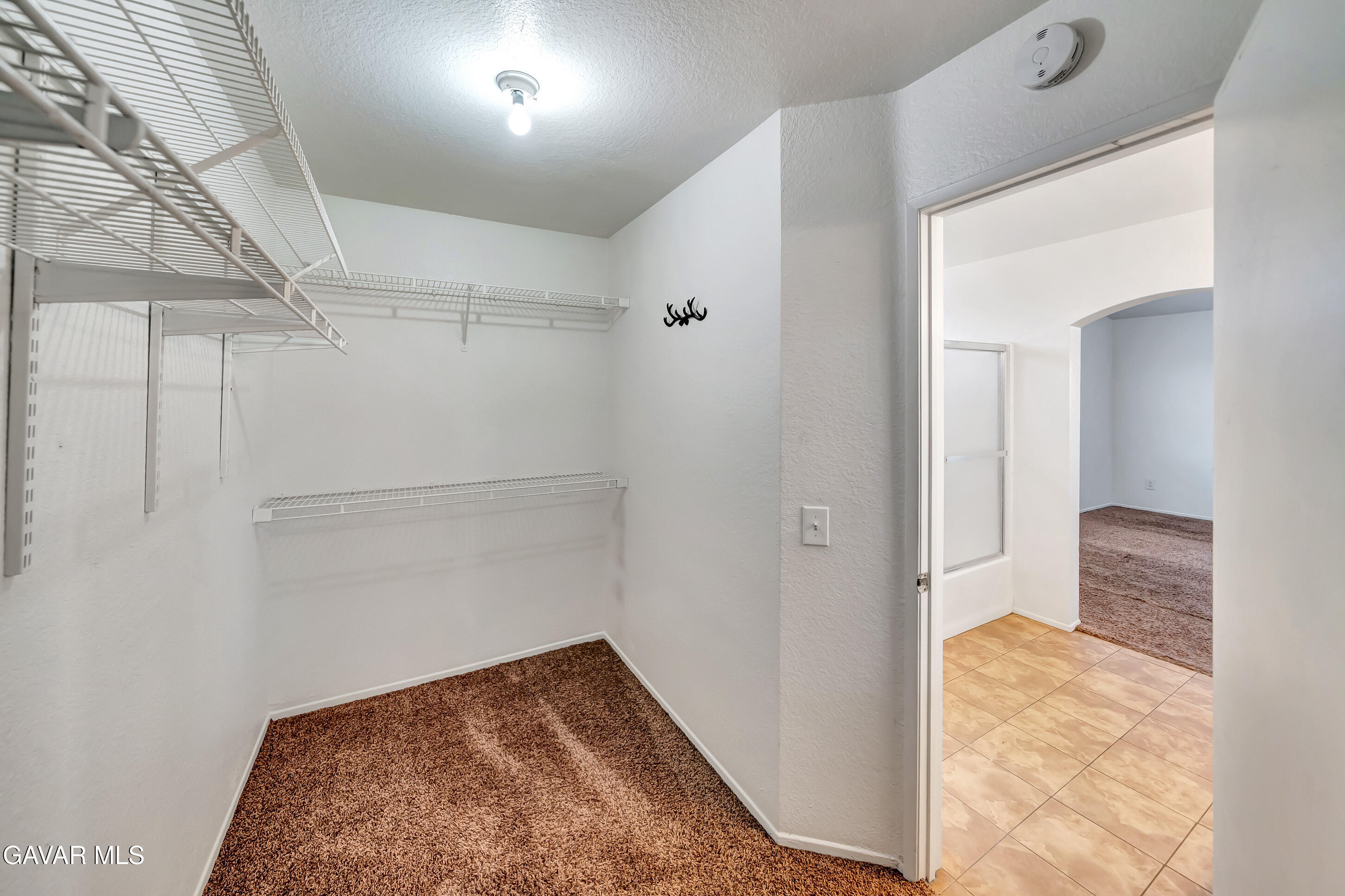 3115 Crowne Drive Palmdale, CA 93551 - Photo 46 of 51 a view of walk in closet