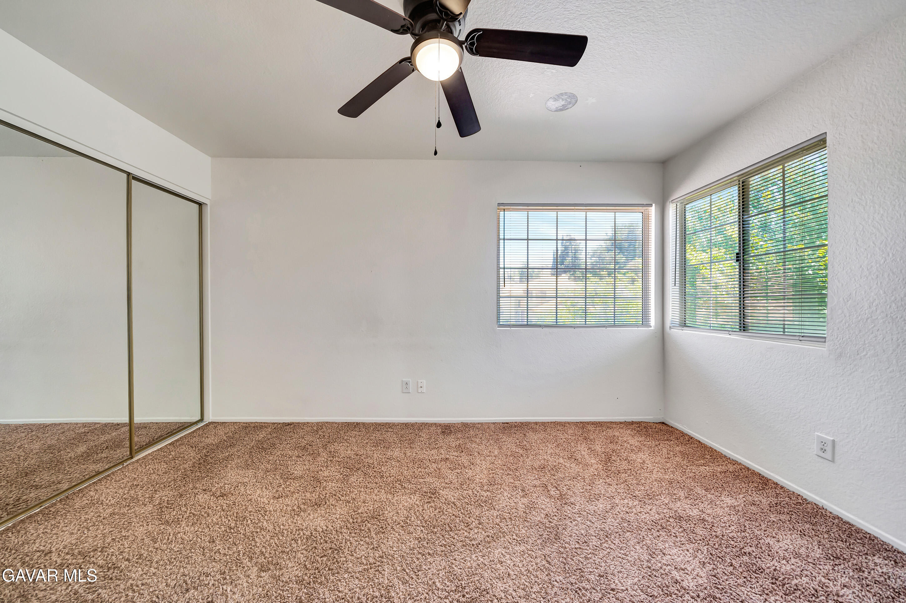 3115 Crowne Drive Palmdale, CA 93551 - Photo 50 of 51 a view of an empty room with a window