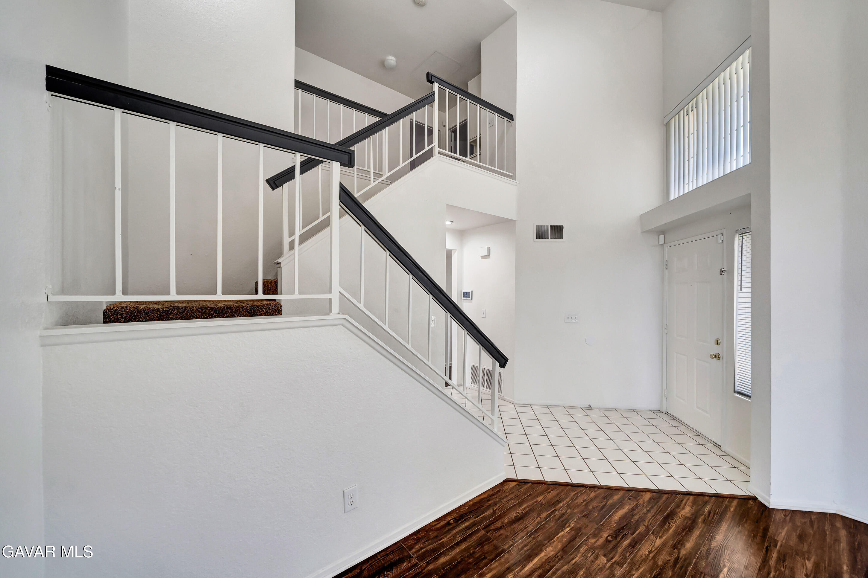 3115 Crowne Drive Palmdale, CA 93551 - Photo 5 of 51 a view of entryway with wooden floor
