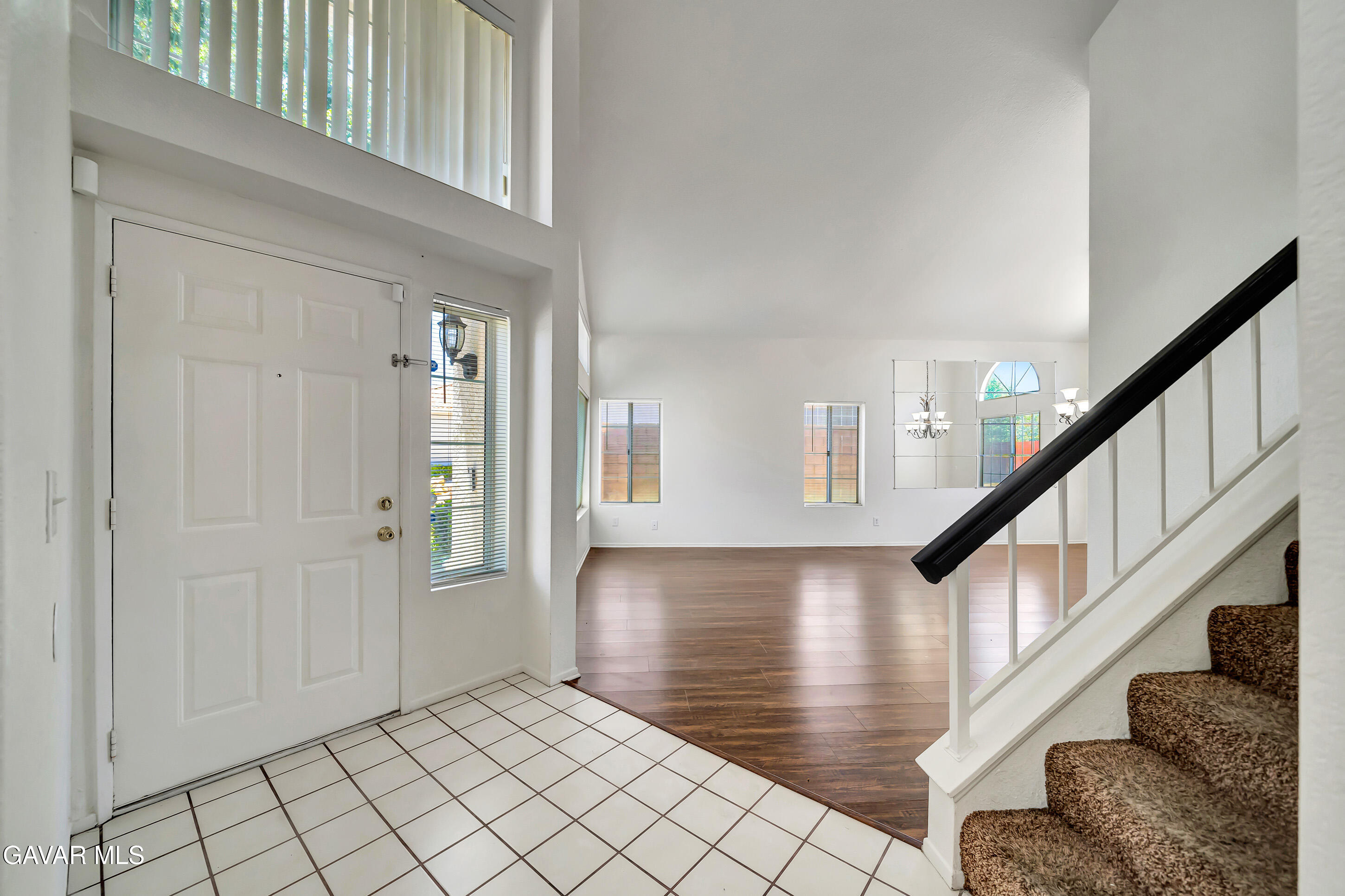 3115 Crowne Drive Palmdale, CA 93551 - Photo 6 of 51 a view of entryway and hall with wooden floor