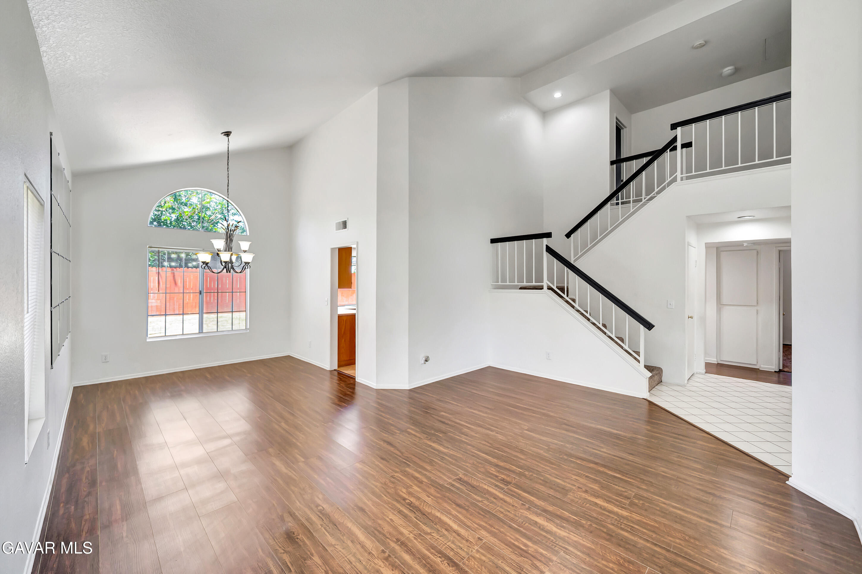 3115 Crowne Drive Palmdale, CA 93551 - Photo 9 of 51 a view of an entryway with wooden floor