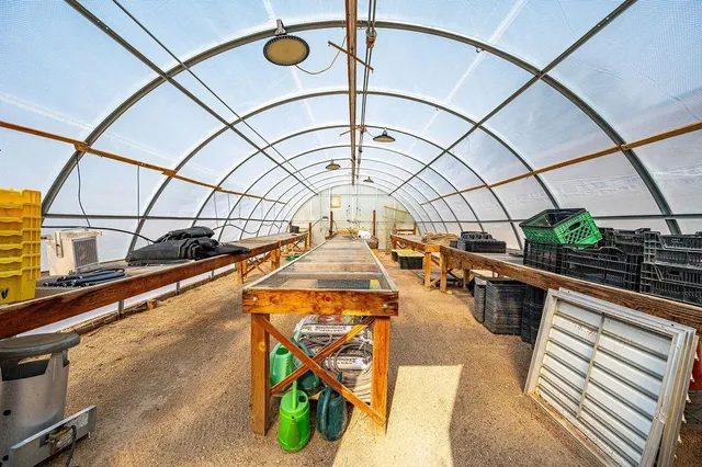 a view of swimming pool with an outdoor space and seating area