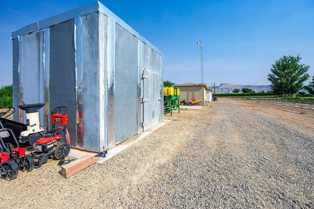 a stove top oven sitting inside of a kitchen
