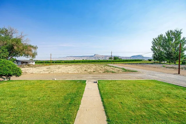 a view of a lake with a big yard