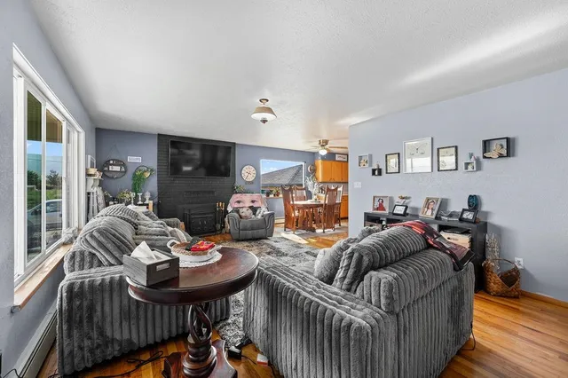 a living room with furniture and a table