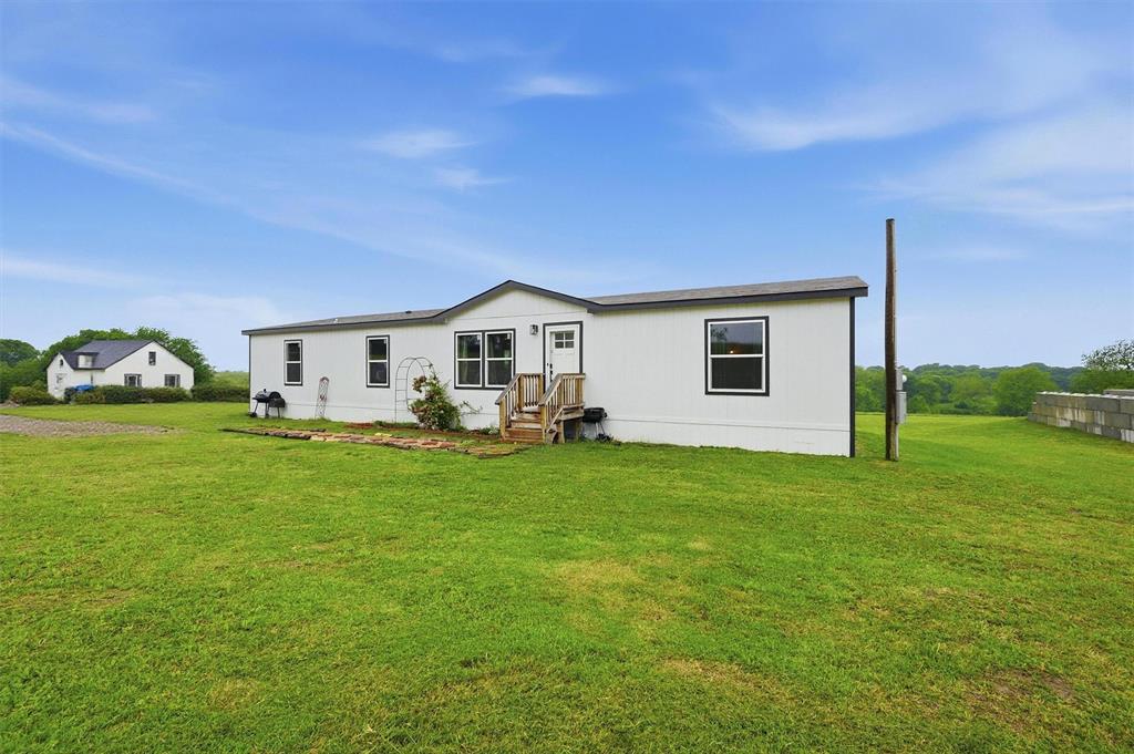 587 Kentucky Town Road Whitewright, TX 75491 - Photo 2 of 39
