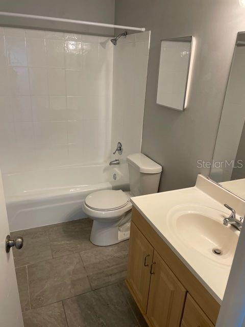 675 Indian Rocks Road North, Unit 209A Belleair Bluffs, FL 33770 - Photo 5 of 7 a bathroom with a toilet sink and shower
