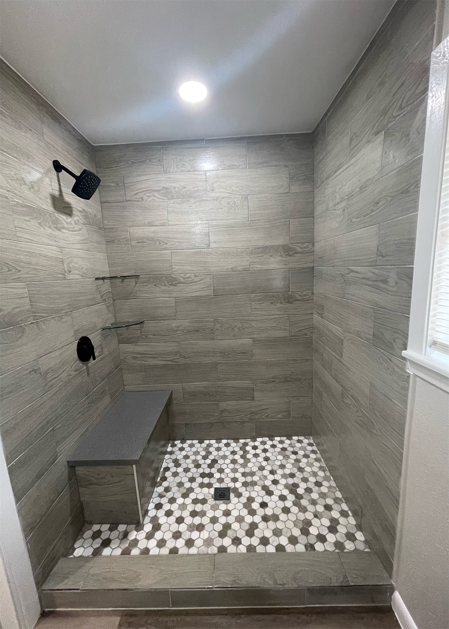 1409 20th Street Huntsville, TX 77340 - Photo 6 of 9 a bathroom with a shower