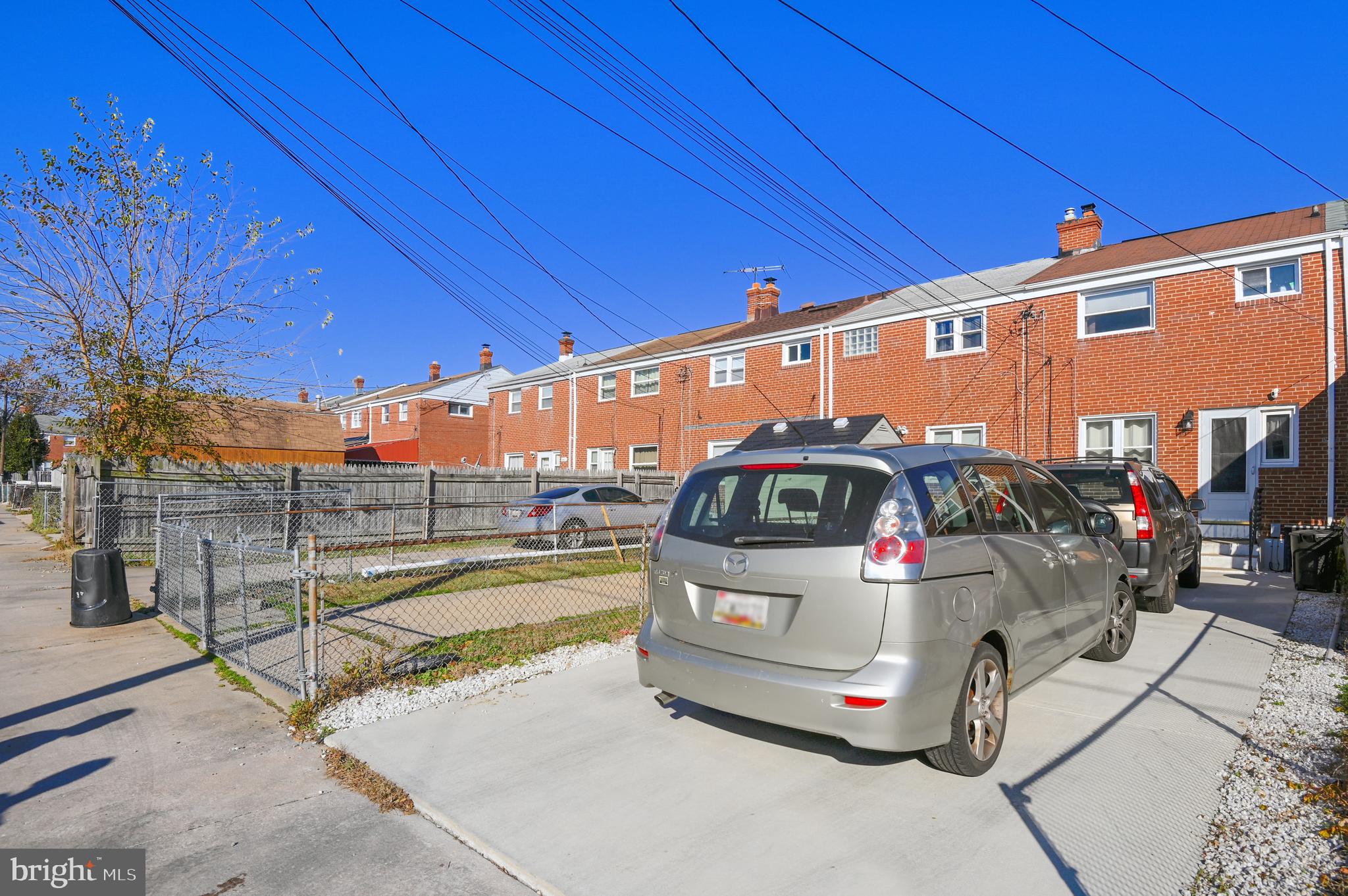 3409 North Point Road Dundalk, MD 21222 - Photo 7 of 36 a car parked in front of a building