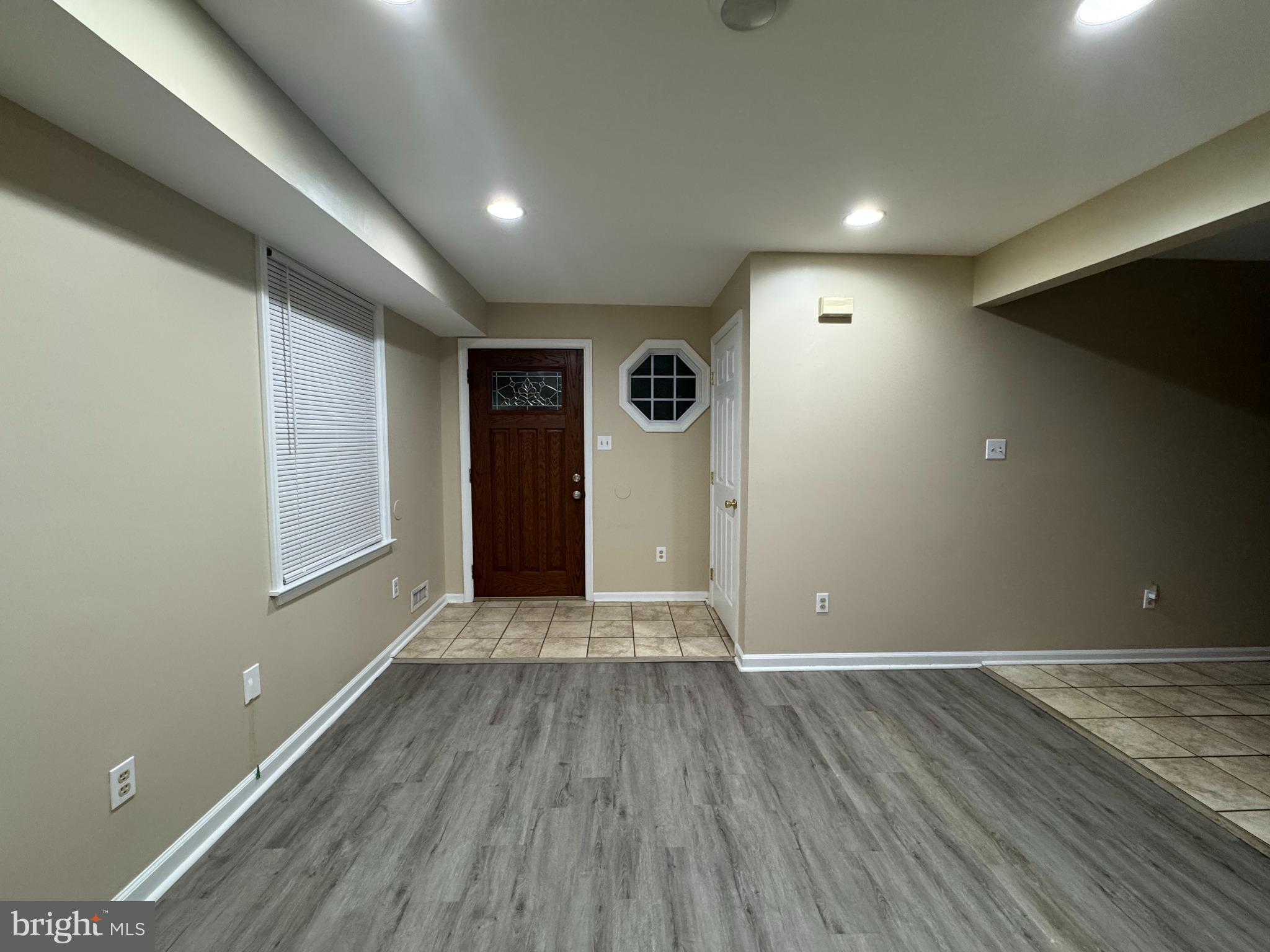 522 A Merchant Street, Unit A Cherry Hill, NJ 08002 - Photo 21 of 24 a view of an empty room with wooden floor