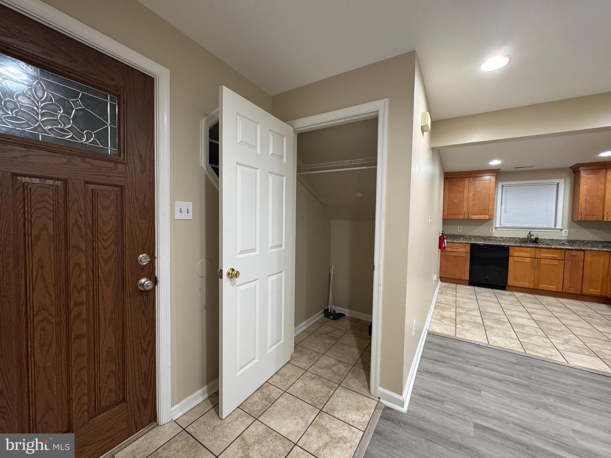 522 A Merchant Street, Unit A Cherry Hill, NJ 08002 - Photo 22 of 24 a view of kitchen with refrigerator and cabinets