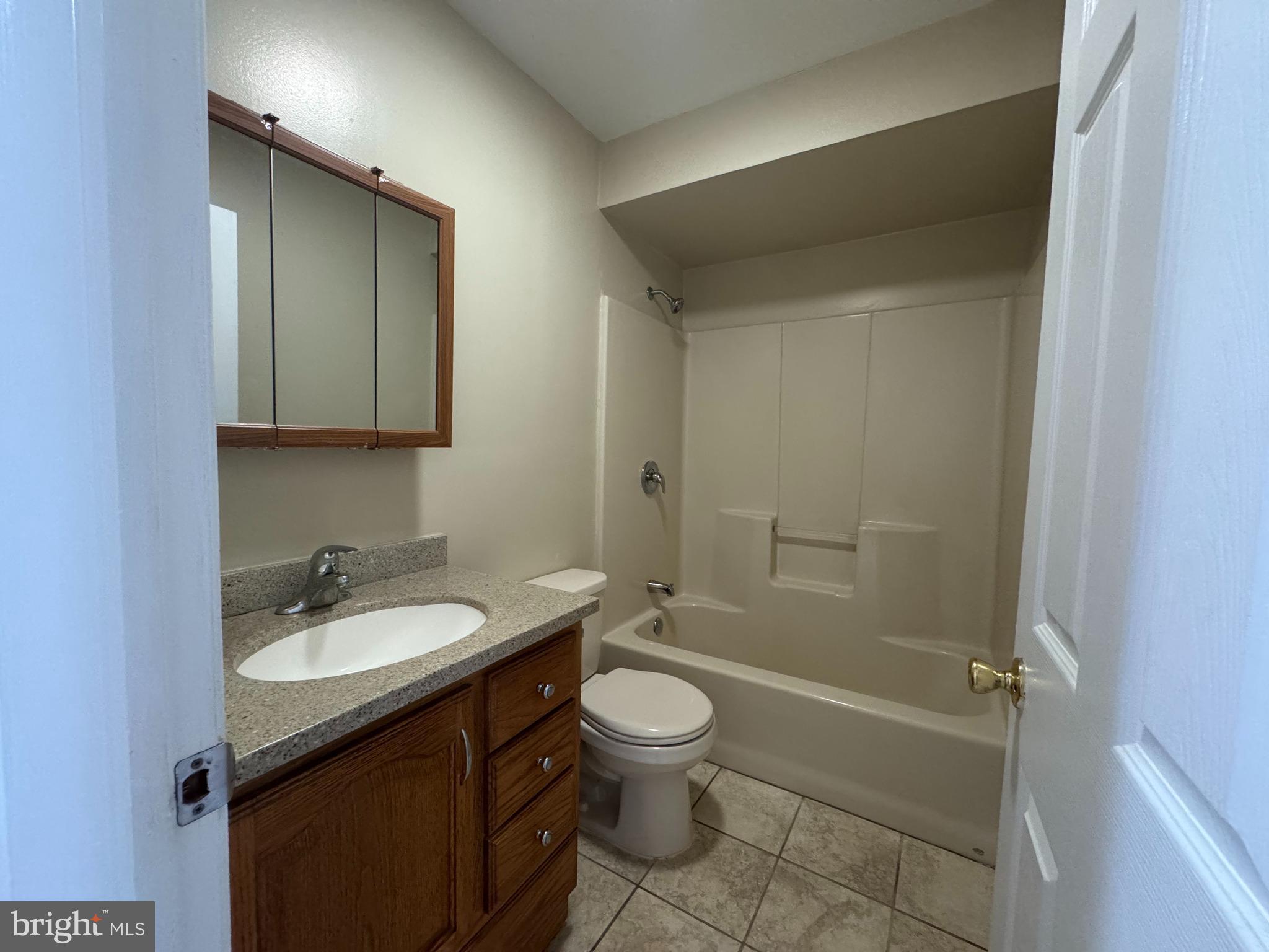 522 A Merchant Street, Unit A Cherry Hill, NJ 08002 - Photo 5 of 24 a bathroom with a sink a toilet and shower