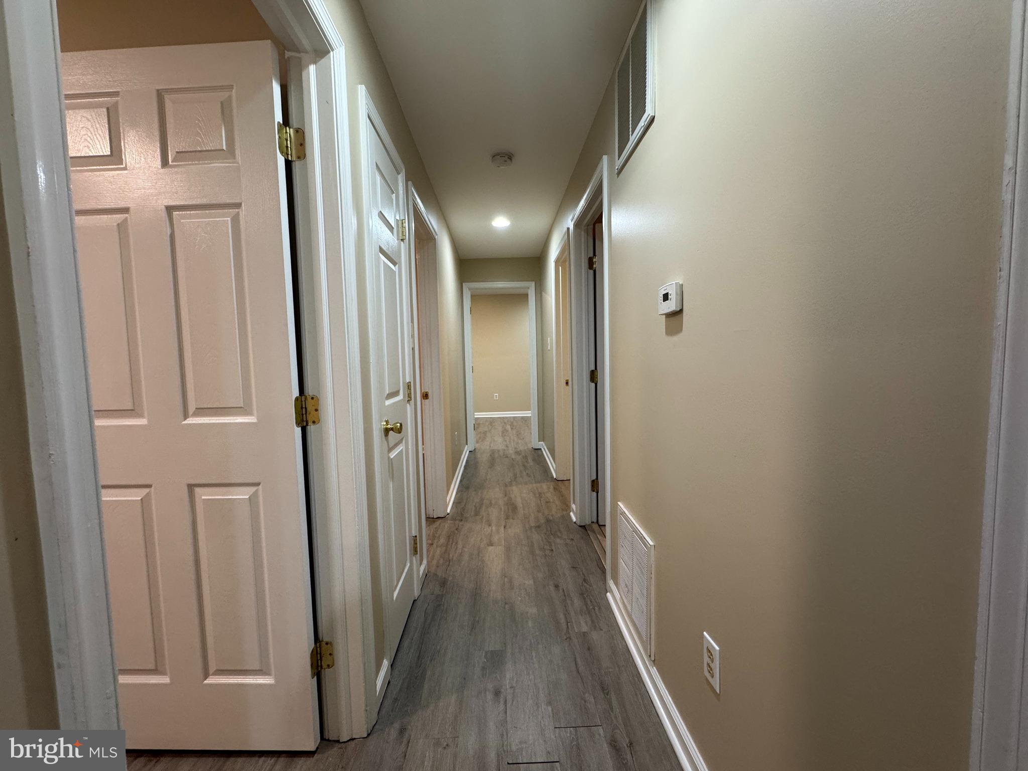 522 A Merchant Street, Unit A Cherry Hill, NJ 08002 - Photo 7 of 24 a view of hallway with wooden floor