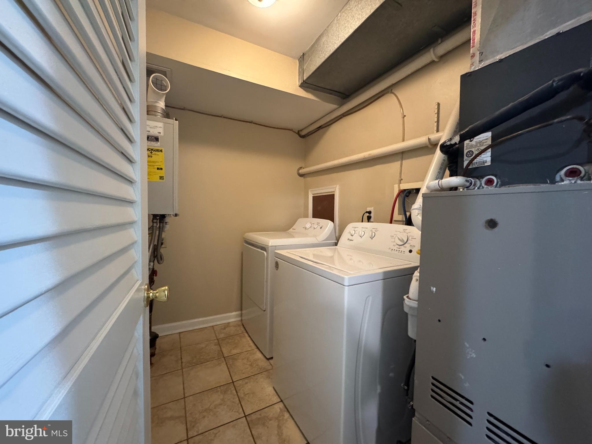522 A Merchant Street, Unit A Cherry Hill, NJ 08002 - Photo 10 of 24 a utility room with dryer and washer