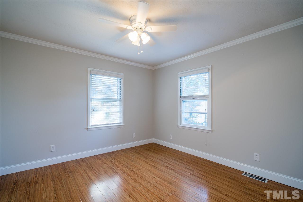 714 New Road Raleigh, NC 27608 - Photo 18 of 25 Natural light shines into these bedrooms with gleaming walls and floors!