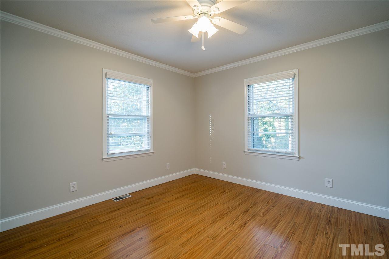 714 New Road Raleigh, NC 27608 - Photo 20 of 25 Natural light shines into these bedrooms with gleaming walls and floors!