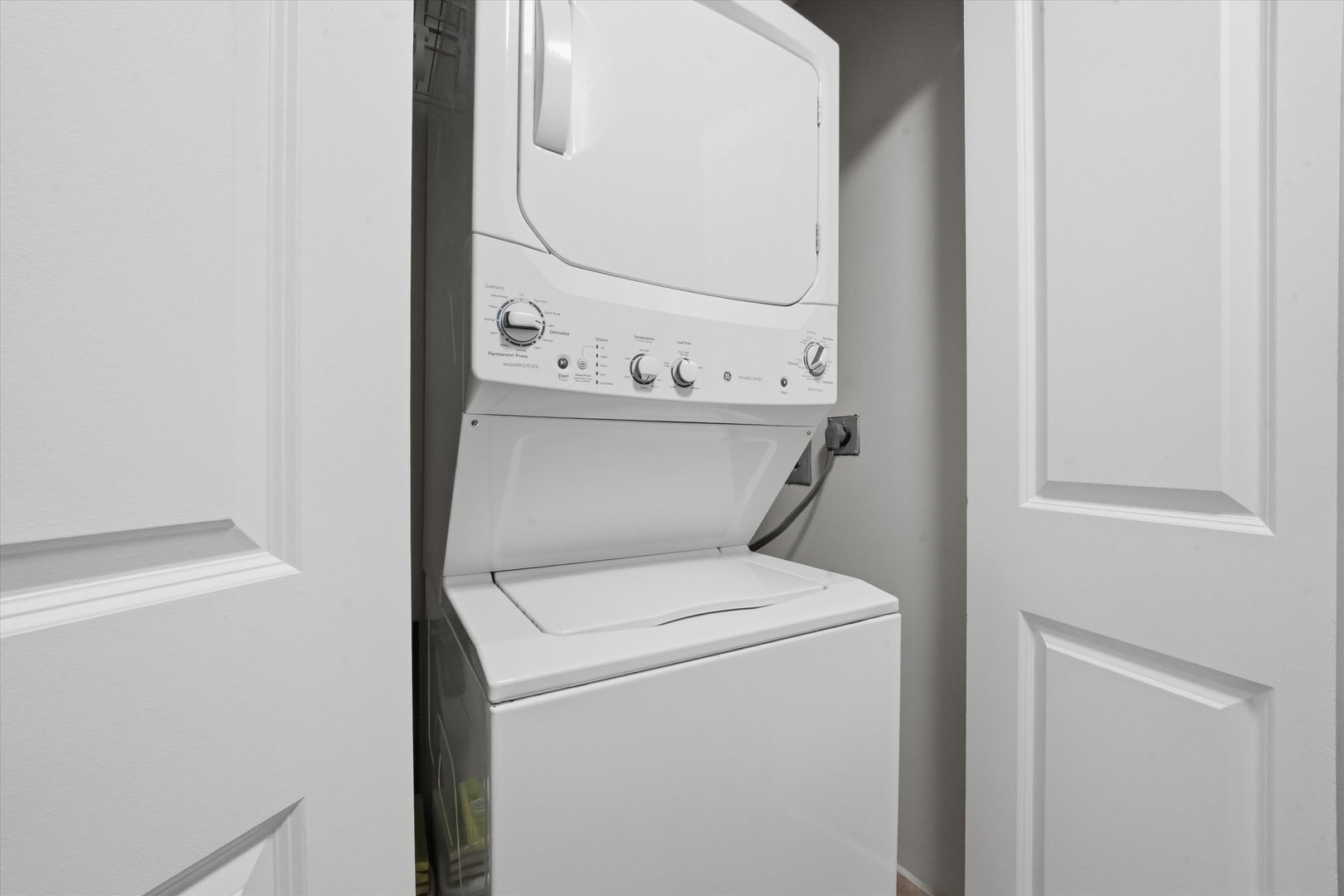 30 East Huron Street, Unit 907 Chicago, IL 60611 - Photo 11 of 13 a view of washer and dryer
