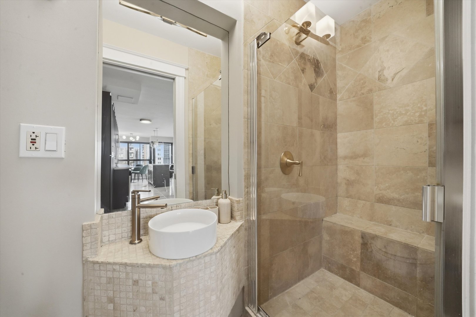 30 East Huron Street, Unit 907 Chicago, IL 60611 - Photo 10 of 13 a bathroom with a sink vanity granite and shower