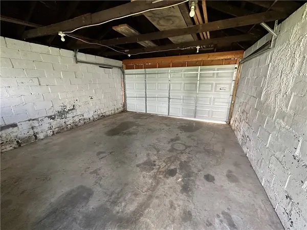 a view of empty room with windows