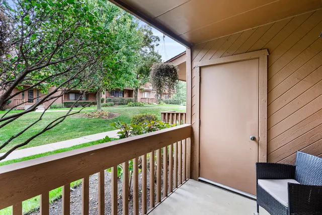 a view of a porch with a yard