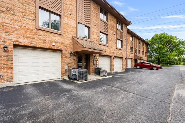 a view of a building with sitting area