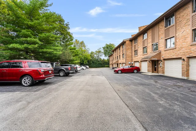 a view of a cars parked in front of a building