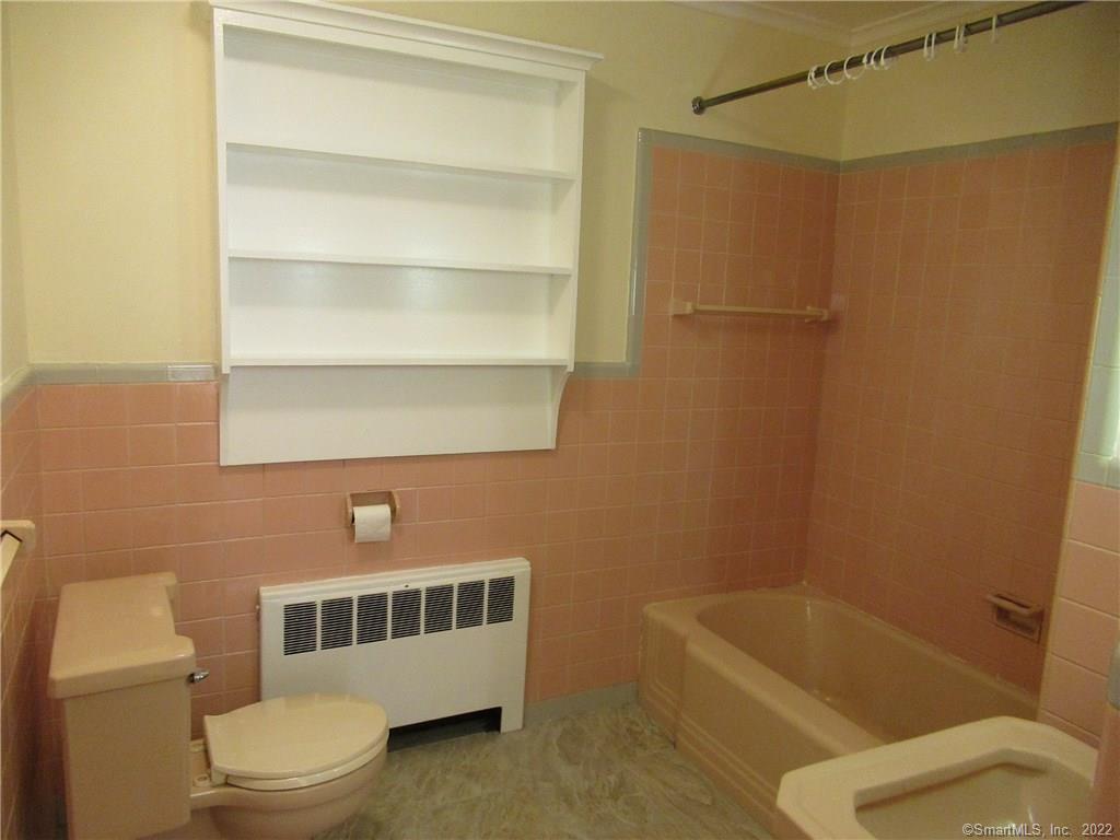11 Burnt Swamp Road Woodbridge, CT 06525 - Photo 20 of 29 a bathroom with a toilet and a bathtub