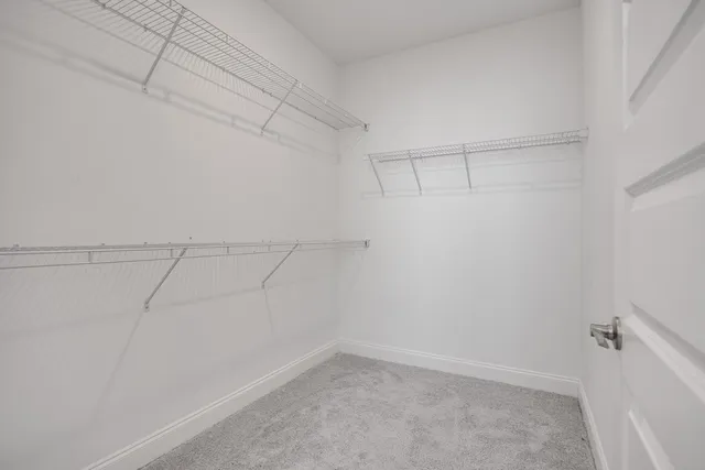 a view of a room with racks on the wall