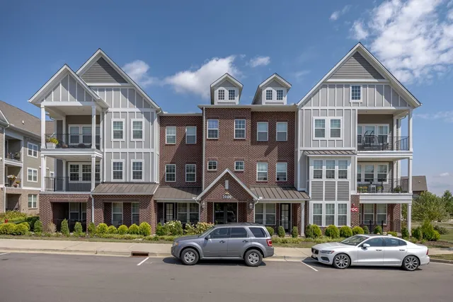 a car parked in front of a house