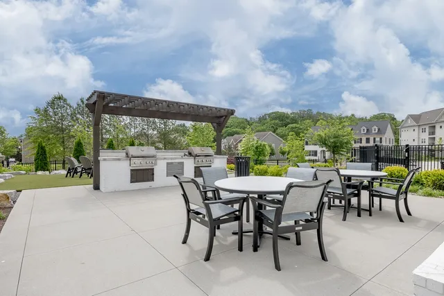 a view of a patio with a backyard