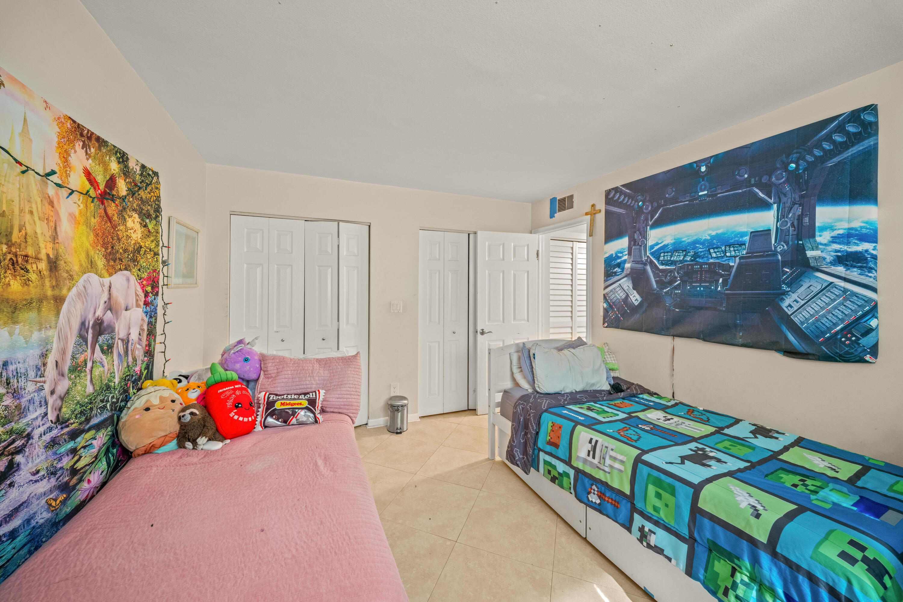 4528 Southwest 54th Street, Unit 302B Dania Beach, FL 33314 - Photo 19 of 33 a bedroom with a bed and a window