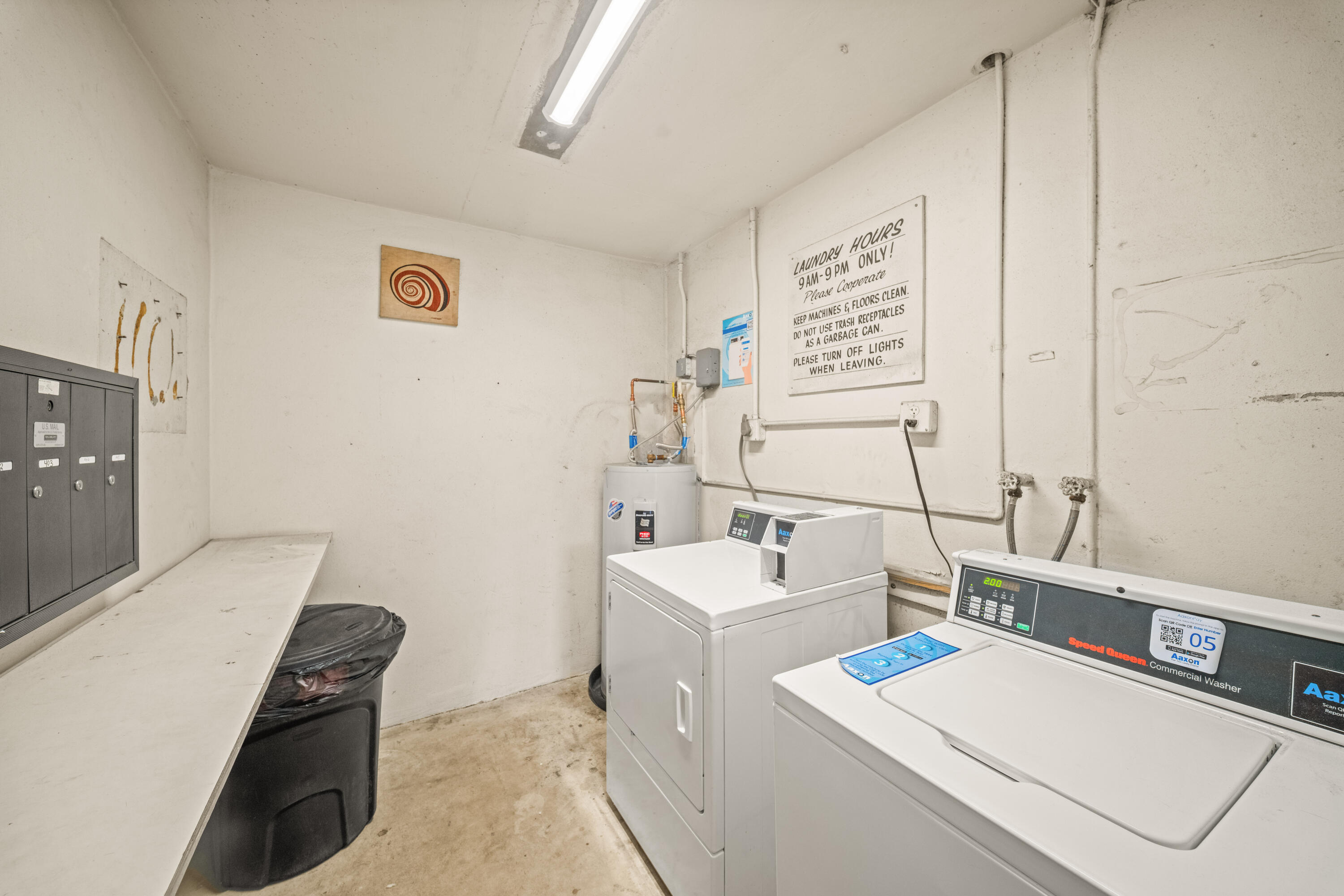 4528 Southwest 54th Street, Unit 302B Dania Beach, FL 33314 - Photo 21 of 33 a utility room with dryer and washer