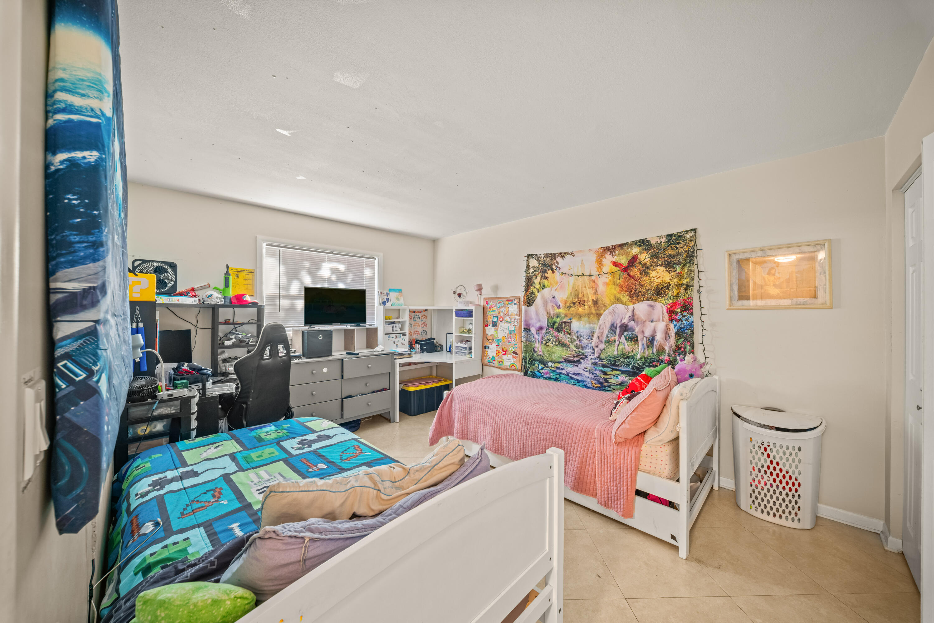 4528 Southwest 54th Street, Unit 302B Dania Beach, FL 33314 - Photo 5 of 33 a living room with furniture and a flat screen tv