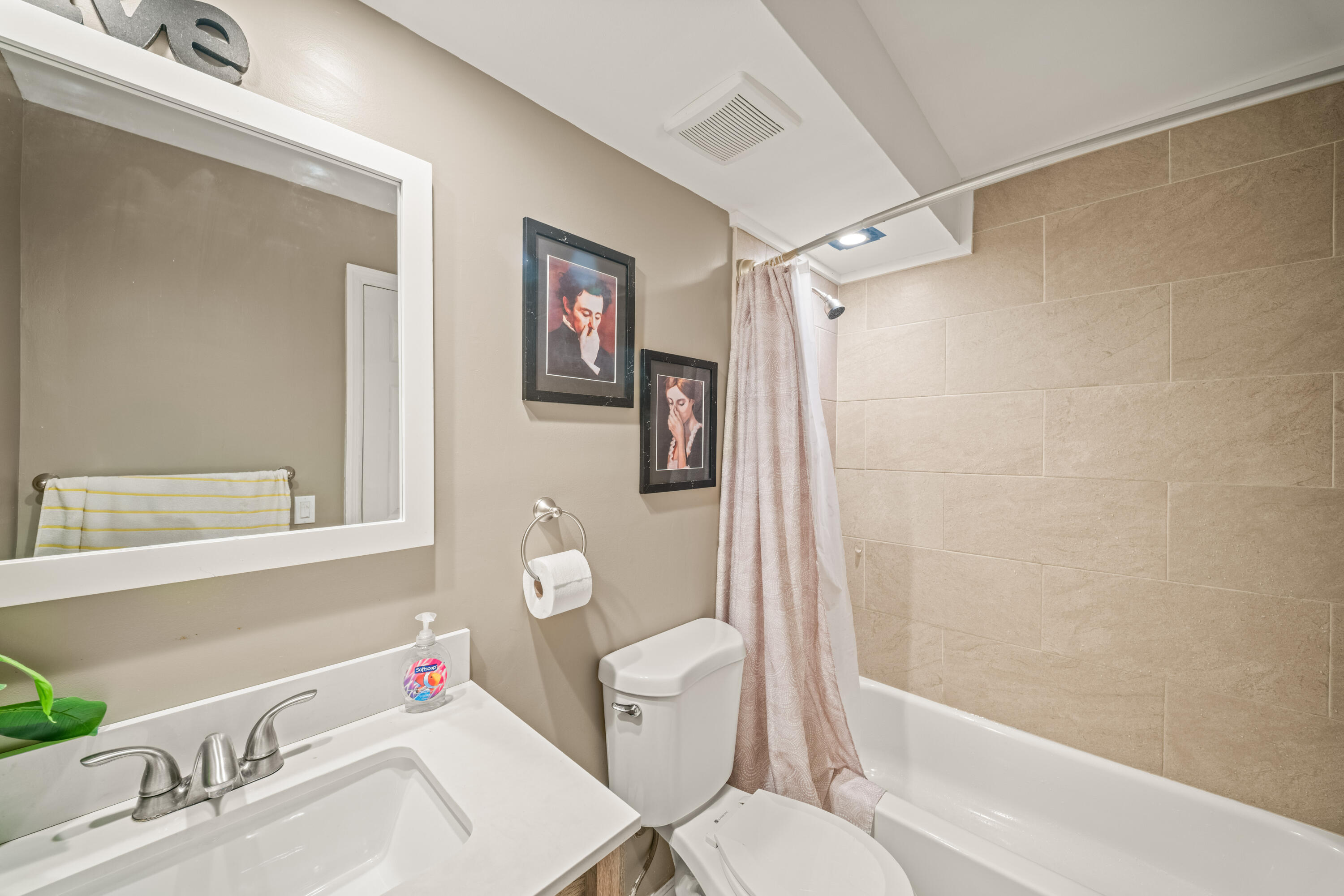 4528 Southwest 54th Street, Unit 302B Dania Beach, FL 33314 - Photo 6 of 33 a bathroom with a sink toilet and shower