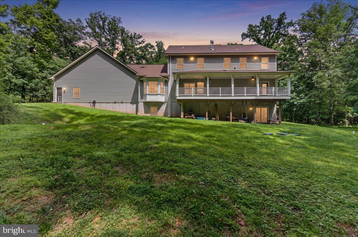 2516 Daisy Road Woodbine, MD 21797 - Photo 4 of 78 Serene retreat with lush greenery.