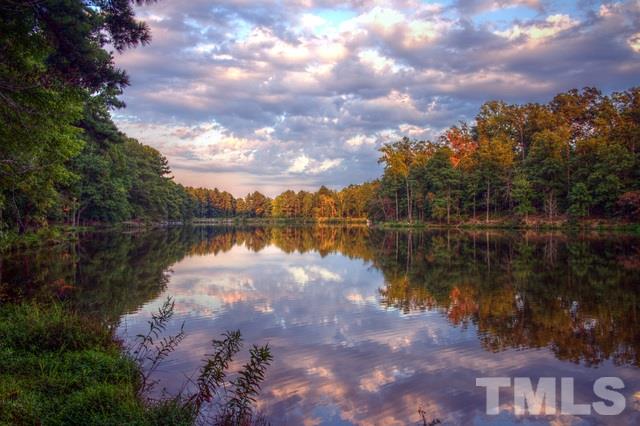 8536 Yucca Trail Raleigh, NC 27615 - Photo 20 of 23 a view of lake with green space