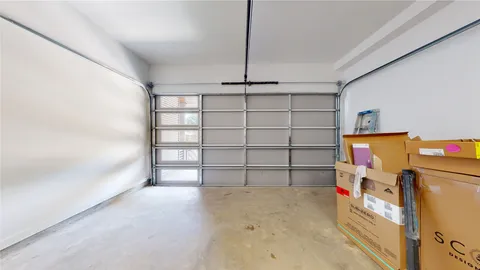 a view of a room with shelf and racks on the wall