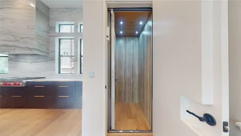 a kitchen that has a sink and a stove